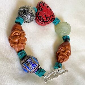 Vintage bracelet mixed carved Asian beads chunky bracelet turquoise spacers